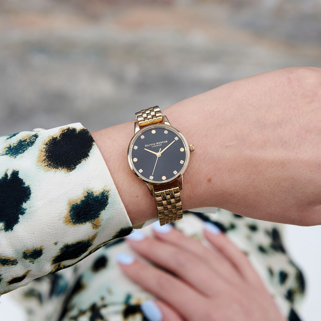 Olivia burton black store and gold watch