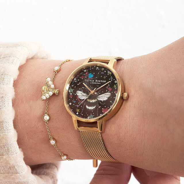 Montre en maille en or à cadran demi au motif d'abeille