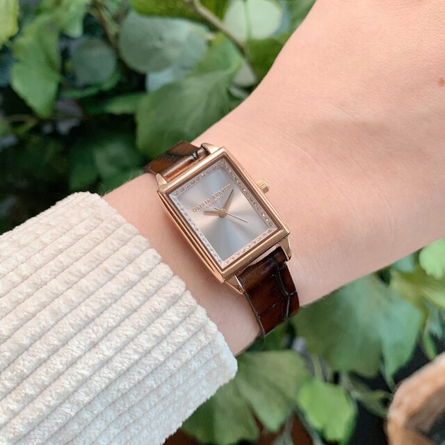 Montre à lunette or rose, croco brun et or rose