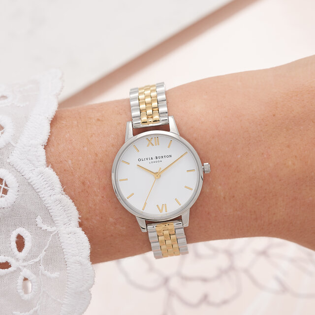 Montre et bracelet or et argent et cadran intermédiaire blanc